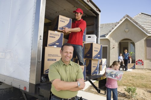 Team of expert removalists efficiently managing a move